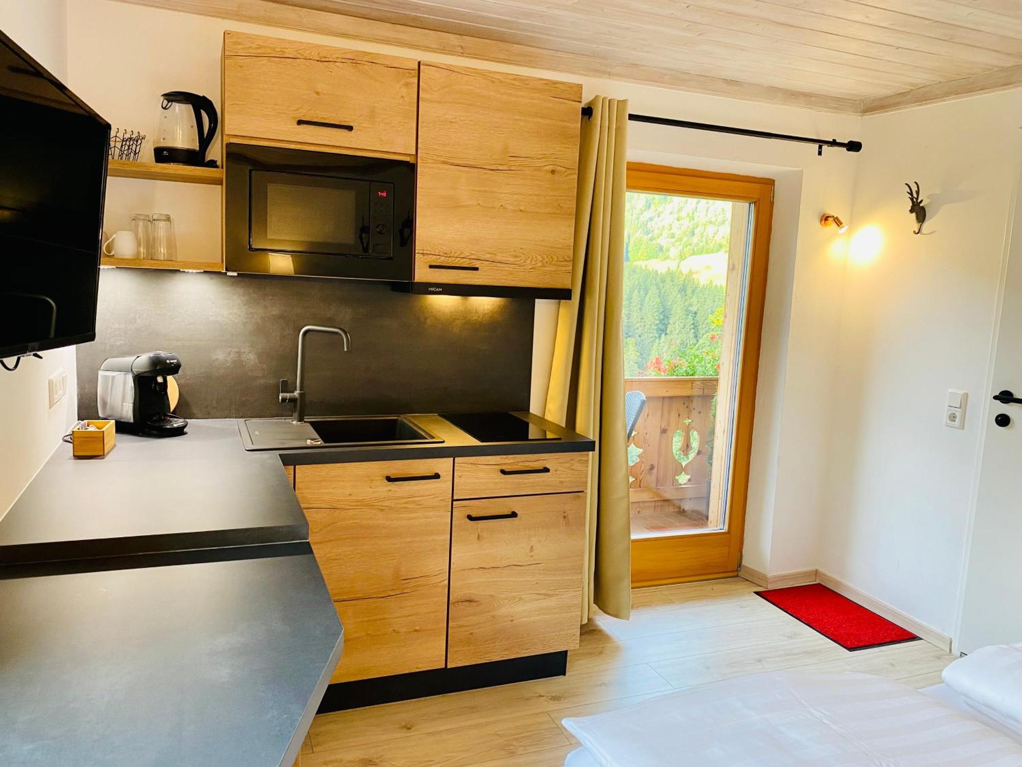 Alm Seasons Premium Chalet & Studios ซาลบาคฮินเทอร์เกลมม์ ห้อง รูปภาพ