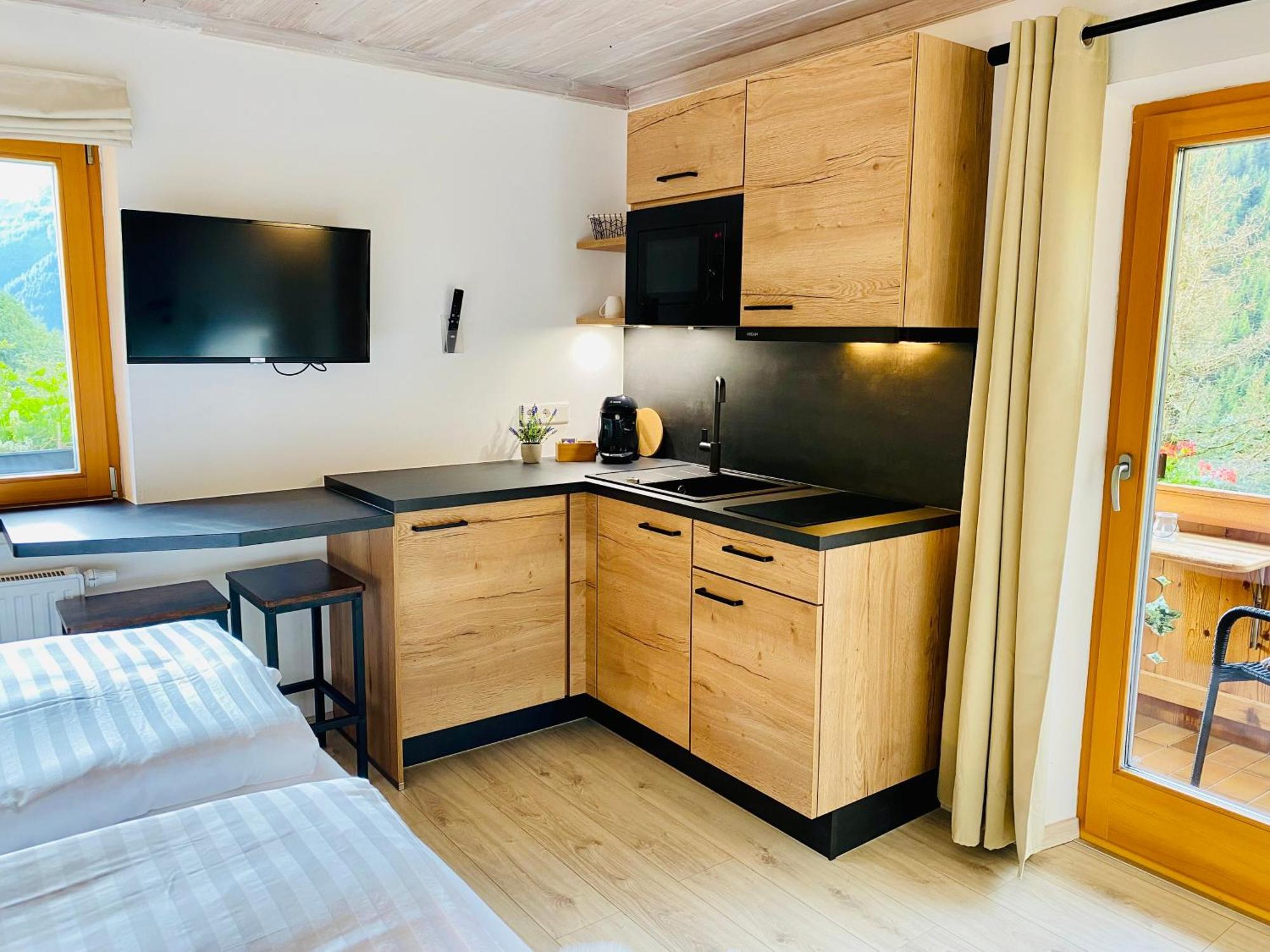 Alm Seasons Premium Chalet & Studios ซาลบาคฮินเทอร์เกลมม์ ห้อง รูปภาพ
